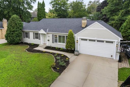 Welcome to an Edina home where everyday living feels elevated and entertaining comes with ease. It blends modern comfort with timeless style, offering light-filled spaces, warm finishes, and a backyard retreat designed for gathering.