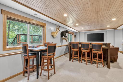 The lower level feautres a spacious family and game room, bar area (wet bar rough-in), 4th bedroom, and a beautiful ¾ bath featuring a tiled shower and heated floors.