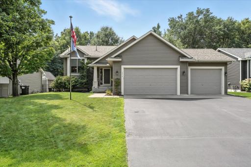 4-stall garage—fully insulated with in-floor heat, floor drain, water spigot, and ample room for vehicles, hobbies, or storage. 3rd stall is tandem.