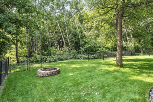 The backyard is fully fenced.