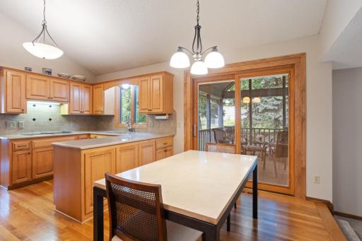 Eat In Kitchen looking out to screened porch