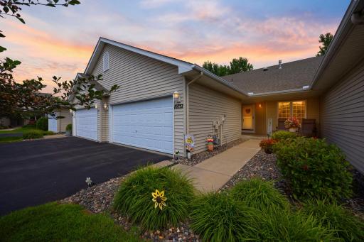 This gorgeous townhome has a private entrance with beautiful landscaping.