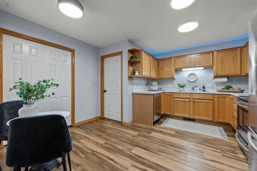 The eat-in kitchen is conveniently off the mud room/laundry room. There is a large closet for shoes, coats, or more kitchen storage.