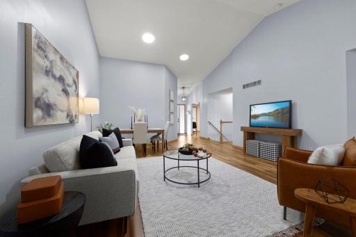 Another view of the invitingly large living and dining room. There are two solar tubes that give an abundance of natural sunlight during the day!