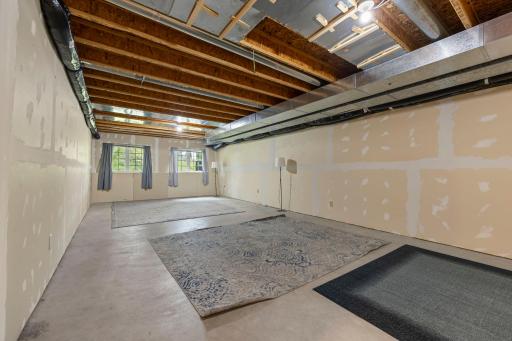 Finish off the rest of the lower level to gain almost 500 sq ft more! The egress windows could be a 4th bedroom if desired or make another large living space.