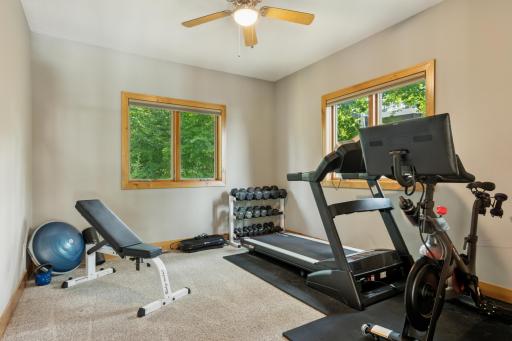 Fourth upper level bedroom currently used as an exercise room, has a very large walk in closet.