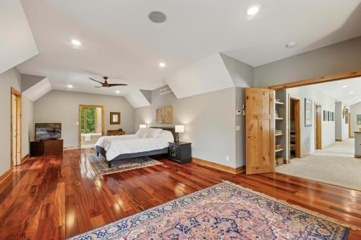 The grand primary suite offers a double door entrance.