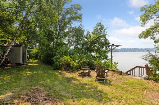 Additional lakeside sitting areaâideal for morning coffee, evening sunsets, or a future dock space.