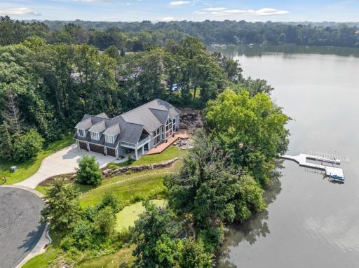 Set on just over 0.70 acres, this exceptional lot offers unmatched privacy, lush natural surroundings, and expansive lake viewsâcomplete with a beach and room to roam.