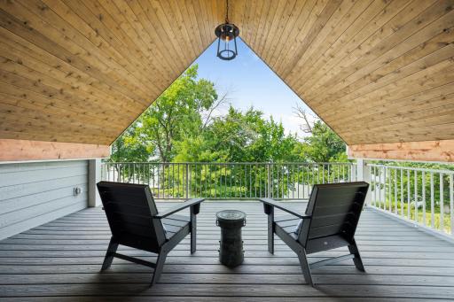Enjoy peaceful mornings or quiet evenings on your private covered deckâtucked off the primary suite and surrounded by treetop views for ultimate relaxation.