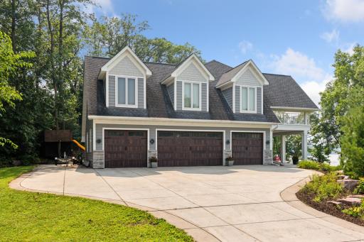 Spacious 4-car heated garage with sleek epoxy floors and built-in floor drainâideal for Minnesota winters and year-round convenience.