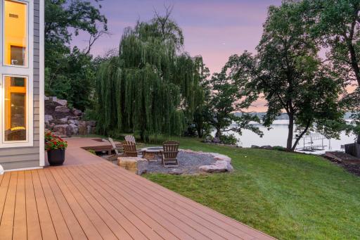 Tucked just off the deck, this cozy gas firepit area offers a perfect gathering spot to take in lake views and sunset skiesâideal for evening relaxation or entertaining.