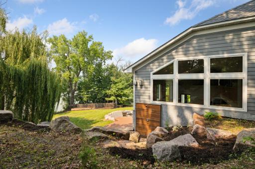 Tucked just off the deck, this exterior hot/cold shower hookup is perfect for rinsing off after lake days or gardening.