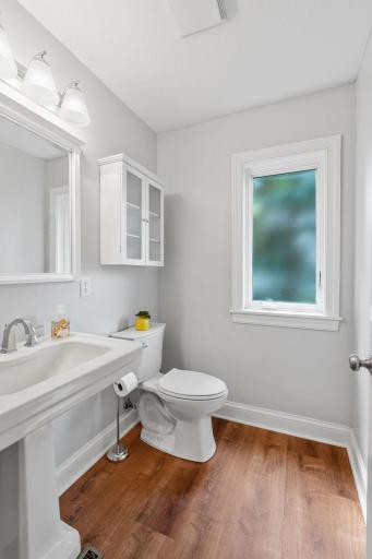 Conveniently located 1/2 bathroom right off the kitchen.