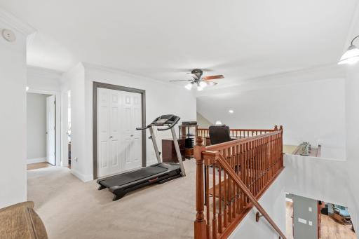 The versatile loft space is perfect for an in home office, exercise space or play area.