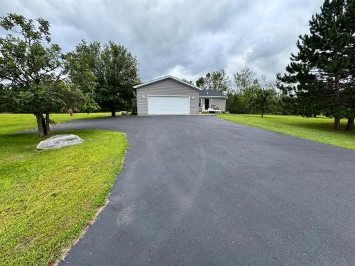 Asphalt Driveway with a bonus parking pad