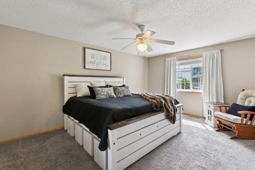 Primary suite with a private entrance to the upper level full bath.