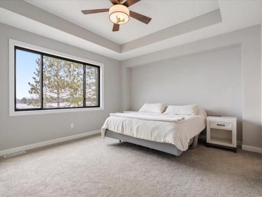 Master bedroom with amazing views of the lake.