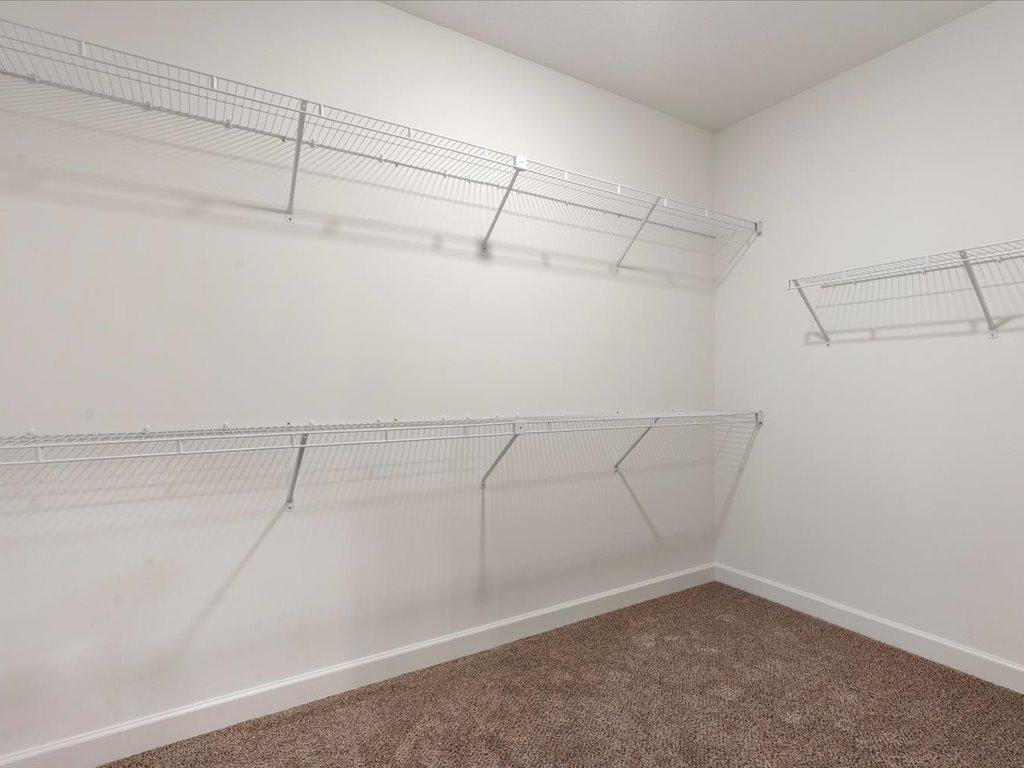 Walk in closet for all the lake clothes.