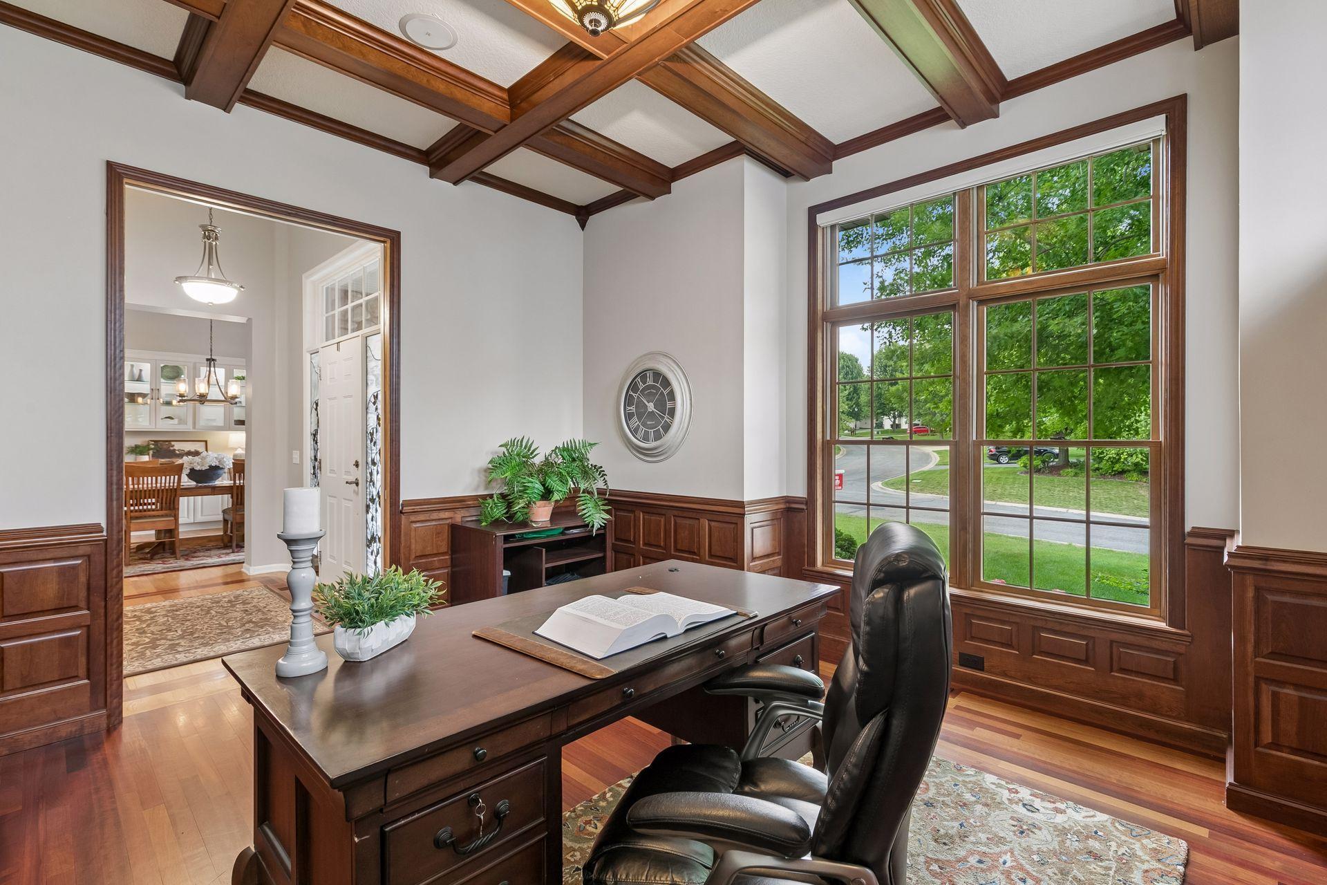 Main level office with french pocket doors