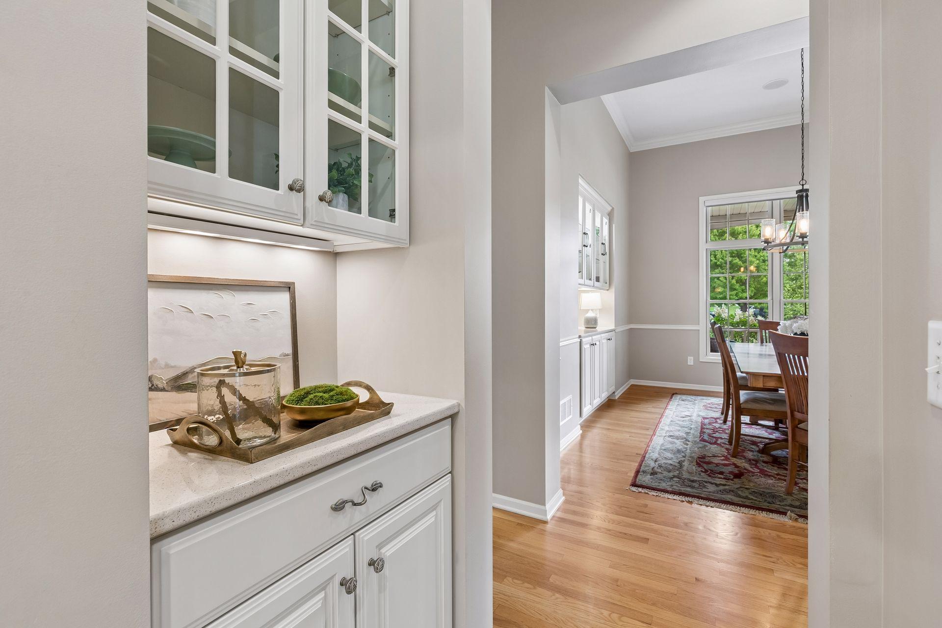 Butler's pantry off kitchen leading to formal dining room
