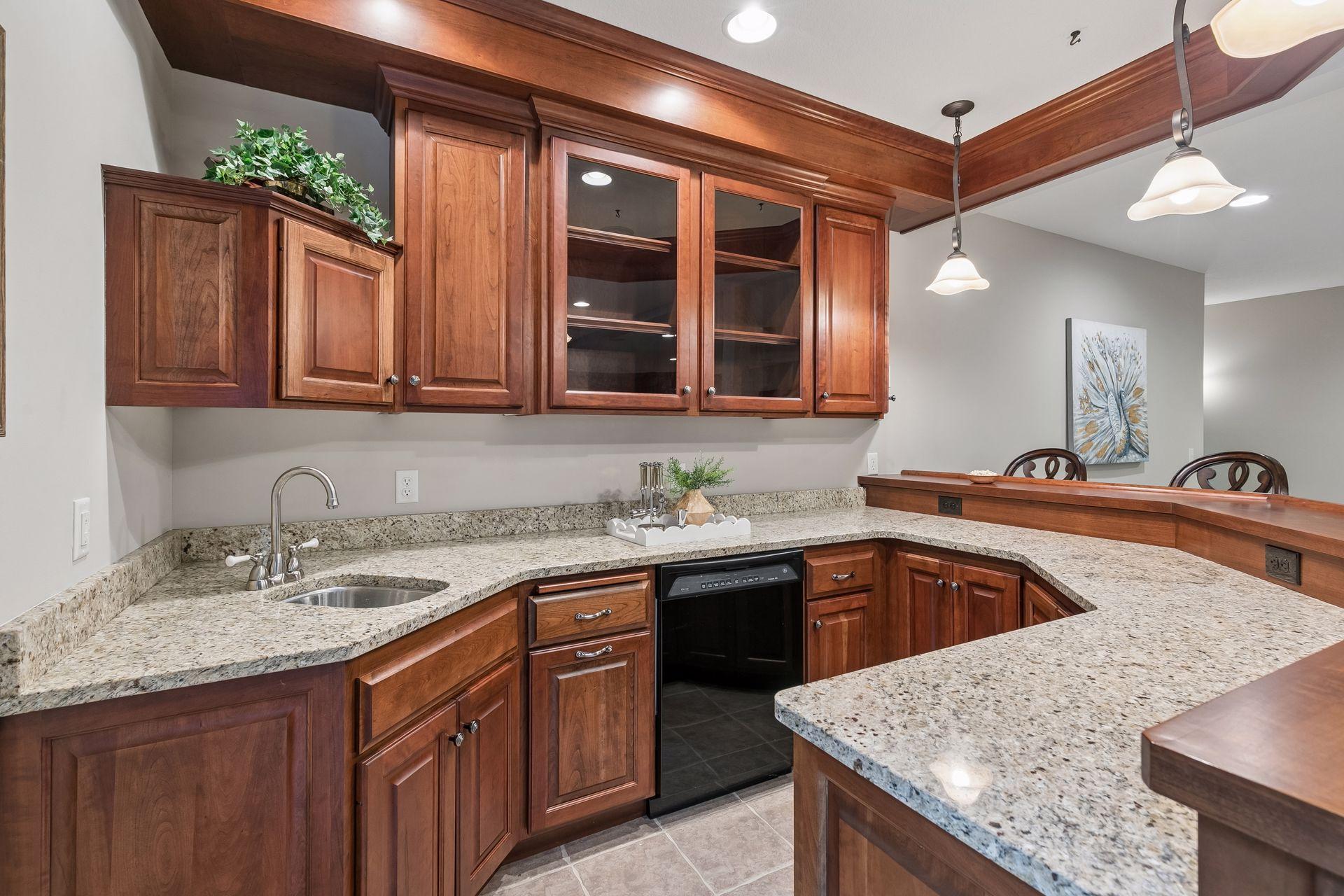 wrap around bar with granite counter tops