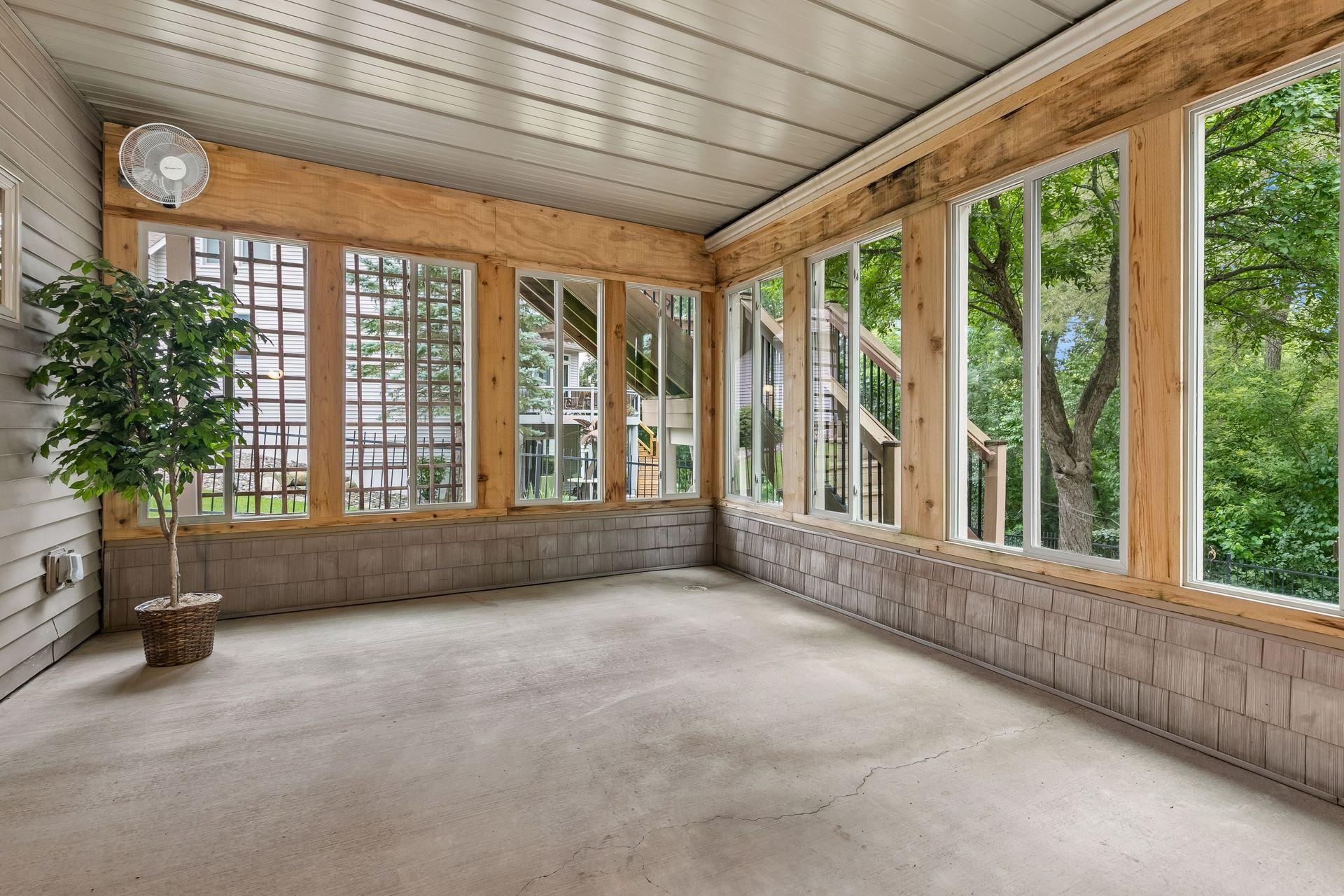 Lower level 3-season porch with new windows 2019