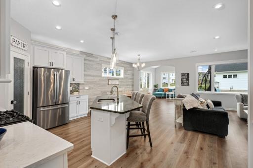 Spacious open concept kitchen, living, and dining.