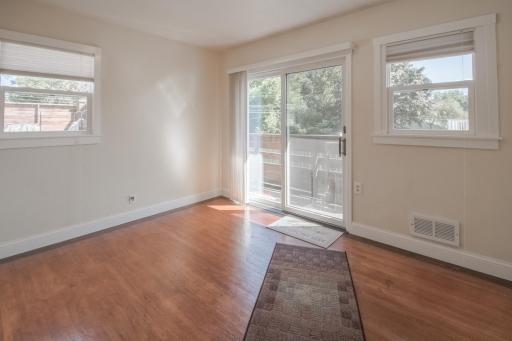4th of 4 main floor bedrooms - walks out to the deck and rooftop patio