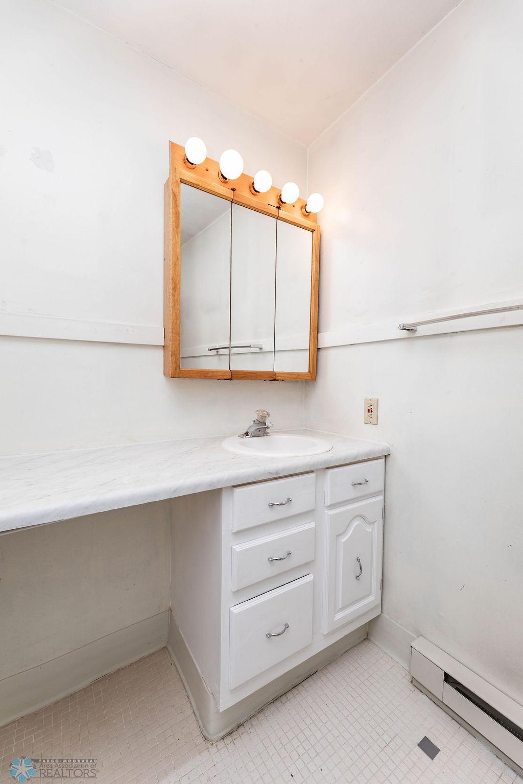 Cute Little Vanity in Main Fl Bathroom