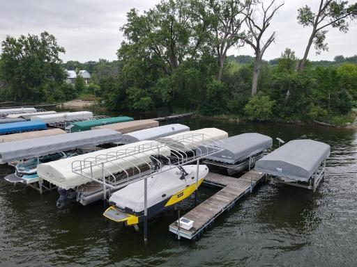 This Yellow boat is in the current slip location to be transferred to the new owner.