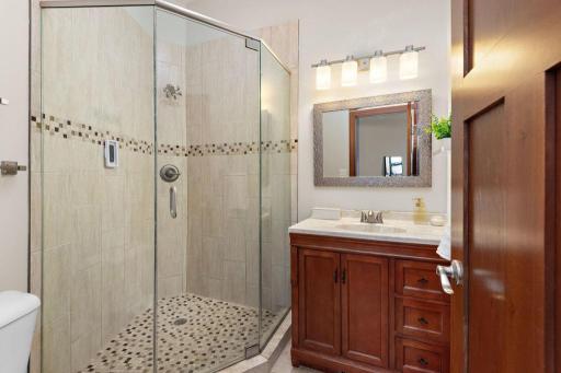 Corian is a striking solid surface material that is highly durable and resistant to scratches, stains, and burns. This makes it an ideal choice for high-traffic areas like bathrooms.