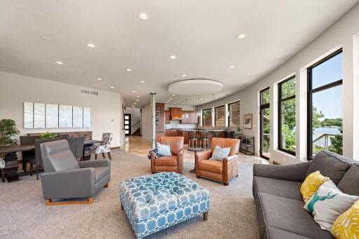 Here resides your open concept gourmet kitchen, living room, and dining area.