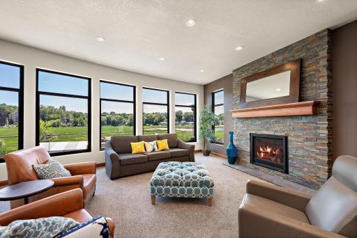 2022 - Fireplace resurfaced with stacked stone 2022 - New Hearth and Home gas fireplace insert