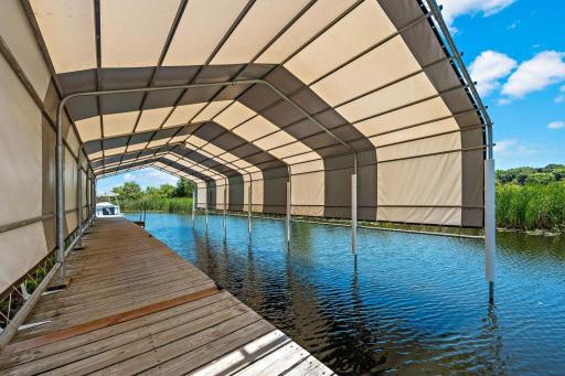 The Frontline Heavy Duty 18 gauge 48 x 18 canopy was added in 2021. Power at dock w/ overhead motion lighting.