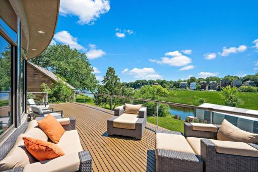 30 x 12 maintenance free deck offers a meandering staircase leading directly to your back yard.