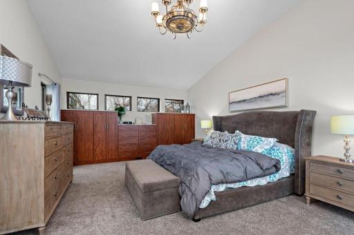 Vaulted ceilings and complete privacy. - In 2024 the custom built-ins shown here along the north wall were added along with the custom closet built-ins by Twin Cities Closet Co.