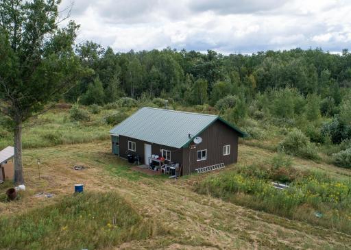 The cabin, built in 2017, is 23x31, fully insulated and finished with tongue and groove pine. Bring your generator and you'll even have electric!