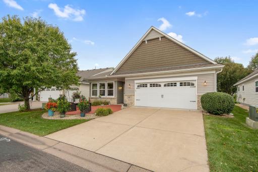 Drive up to this one level detached townhome