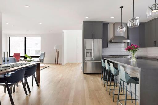 Gorgeous White Oak flooring spans the entire home