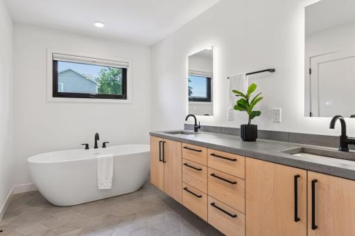 The primary bath is pure Scandinavian inspired luxury