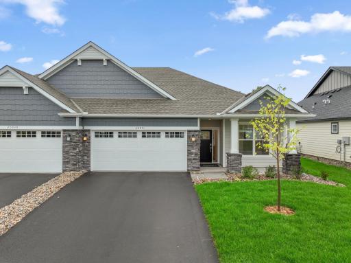 Photo is of the actual home. This Magnolia home comes complete with irrigation, landscaping, trees, and a full yard of sod.