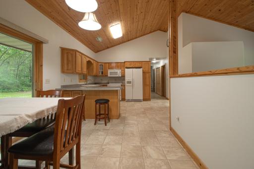 Kitchen - Dining with sliding door leading to backyard patio