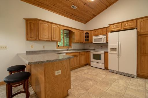 Spacious kitchen with plenty of cupboard and counter space
