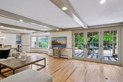 Family room in lower level walks out to pool