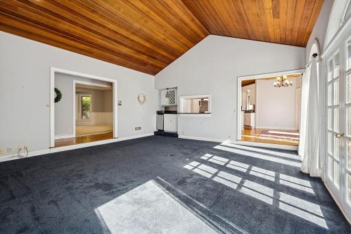 Living Room with access to kitchen, breakfast area and formal dining