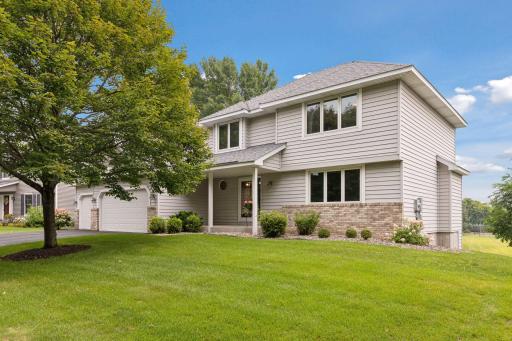 Meticulously maintained and located on a quiet street overlooking Holtz Farm