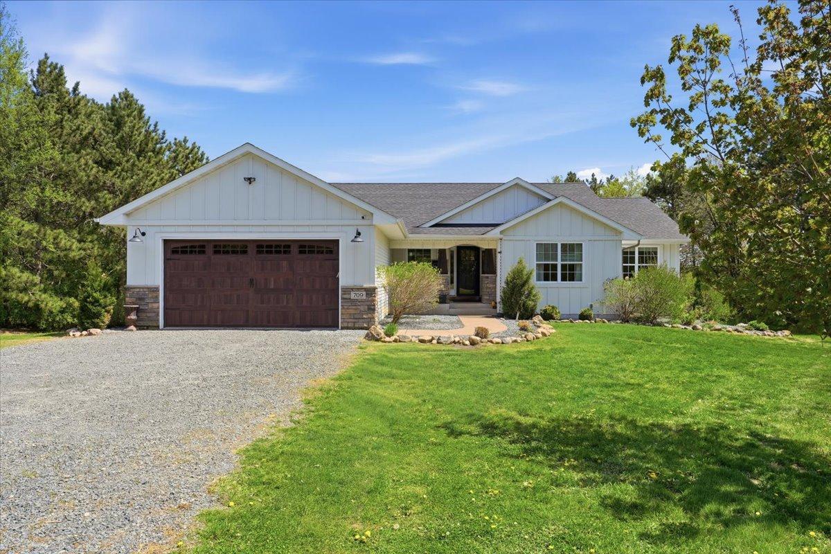 This custom rambler has classic, yet modern looks with a finished walk-out basement