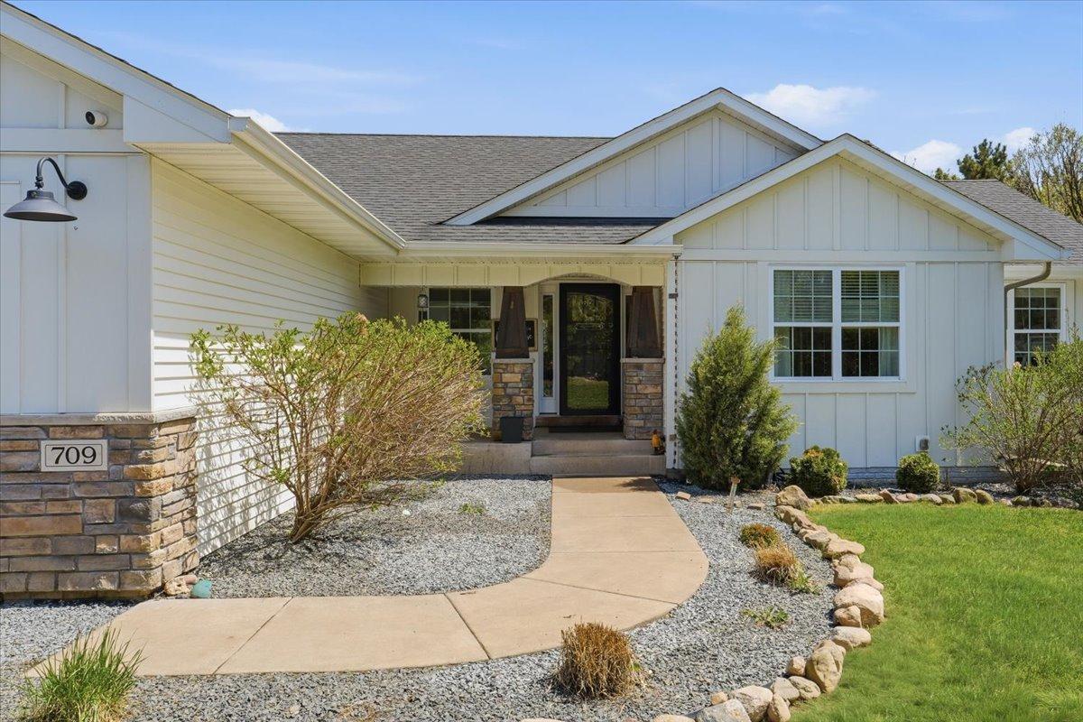 This covered front porch will take your breath away