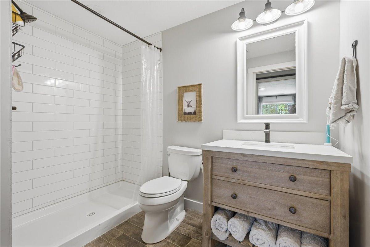 Lower-level bathroom with beatiful, modern features